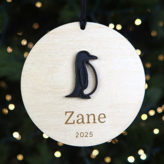 Wood Engraved Penguin Personalized Kids Name Christmas Ornament 2025 or Unique Christmas stocking tag for kids handmade by Moon Rock Prints