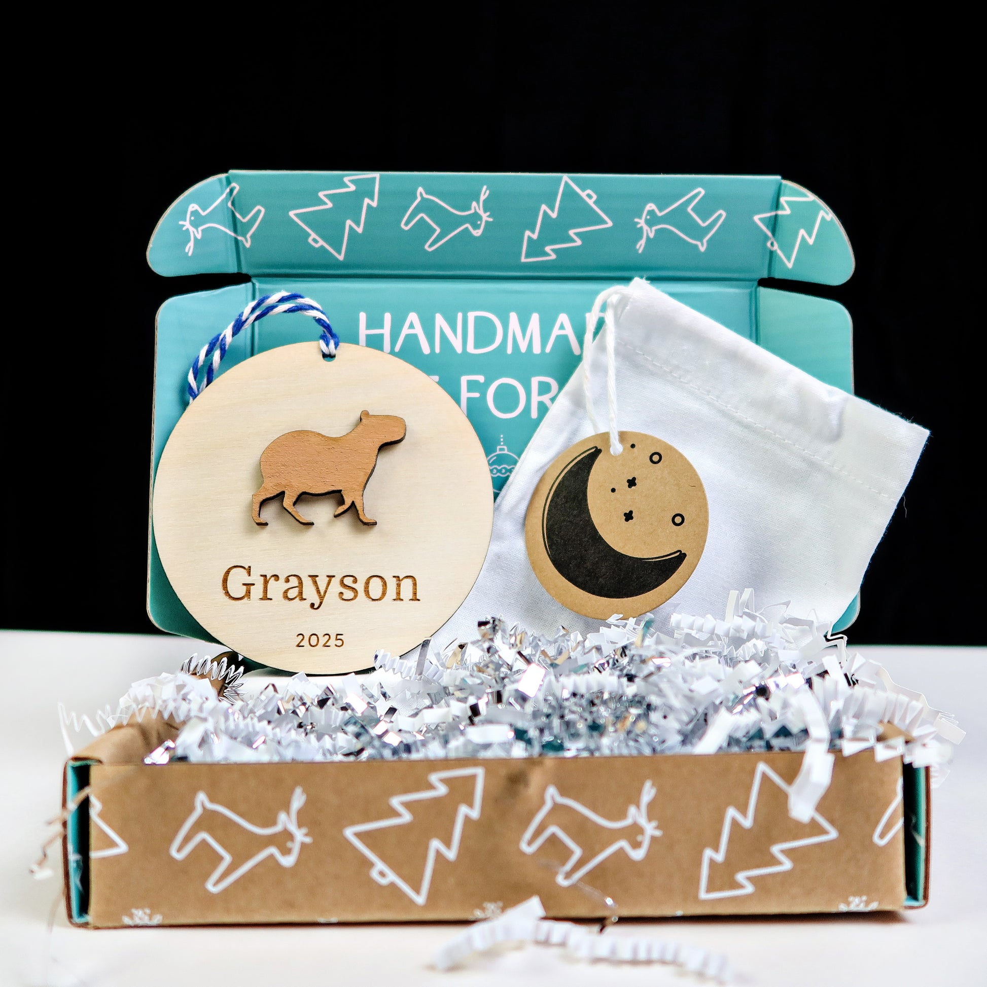 Wood Engraved Capybara Personalized Kids Name Christmas Ornament 2025 or Unique Christmas stocking tag for kids handmade by Moon Rock Prints comes in cute gift box