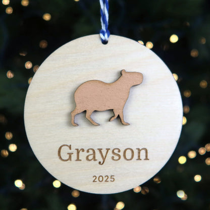 Wood Engraved Capybara Personalized Kids Name Christmas Ornament 2025 or Unique Christmas stocking tag for kids handmade by Moon Rock Prints 