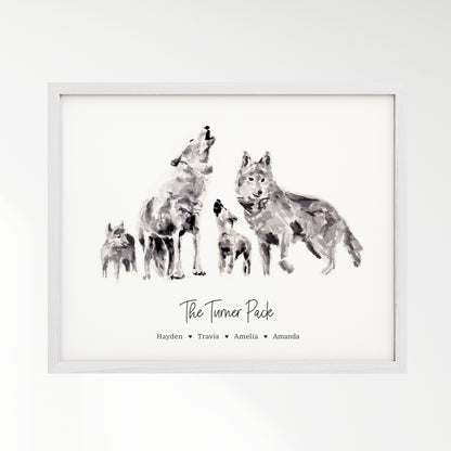 Personalized Wolf Family of 4 Watercolor Art Print framed in a white wood frame by Moon Rock Prints
