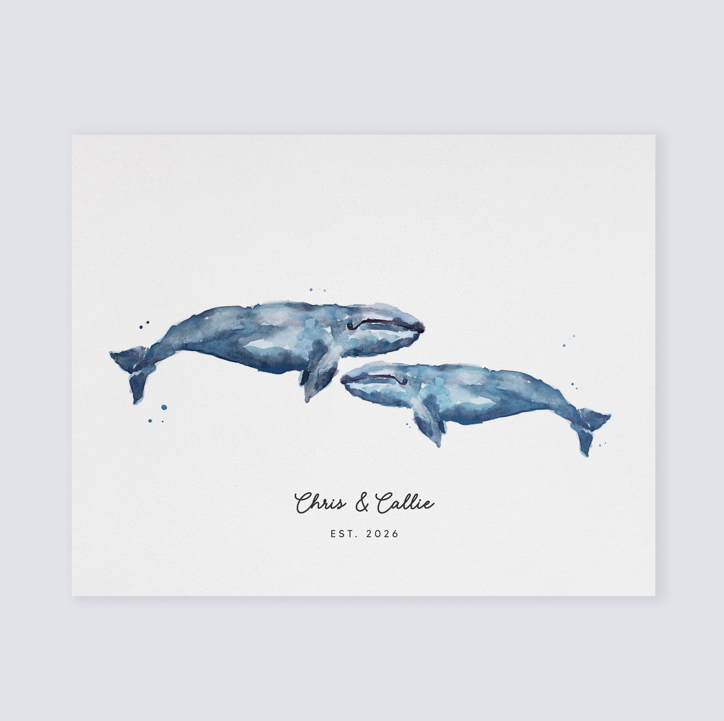 Watercolor illustration of two whales with personalized text on a light background