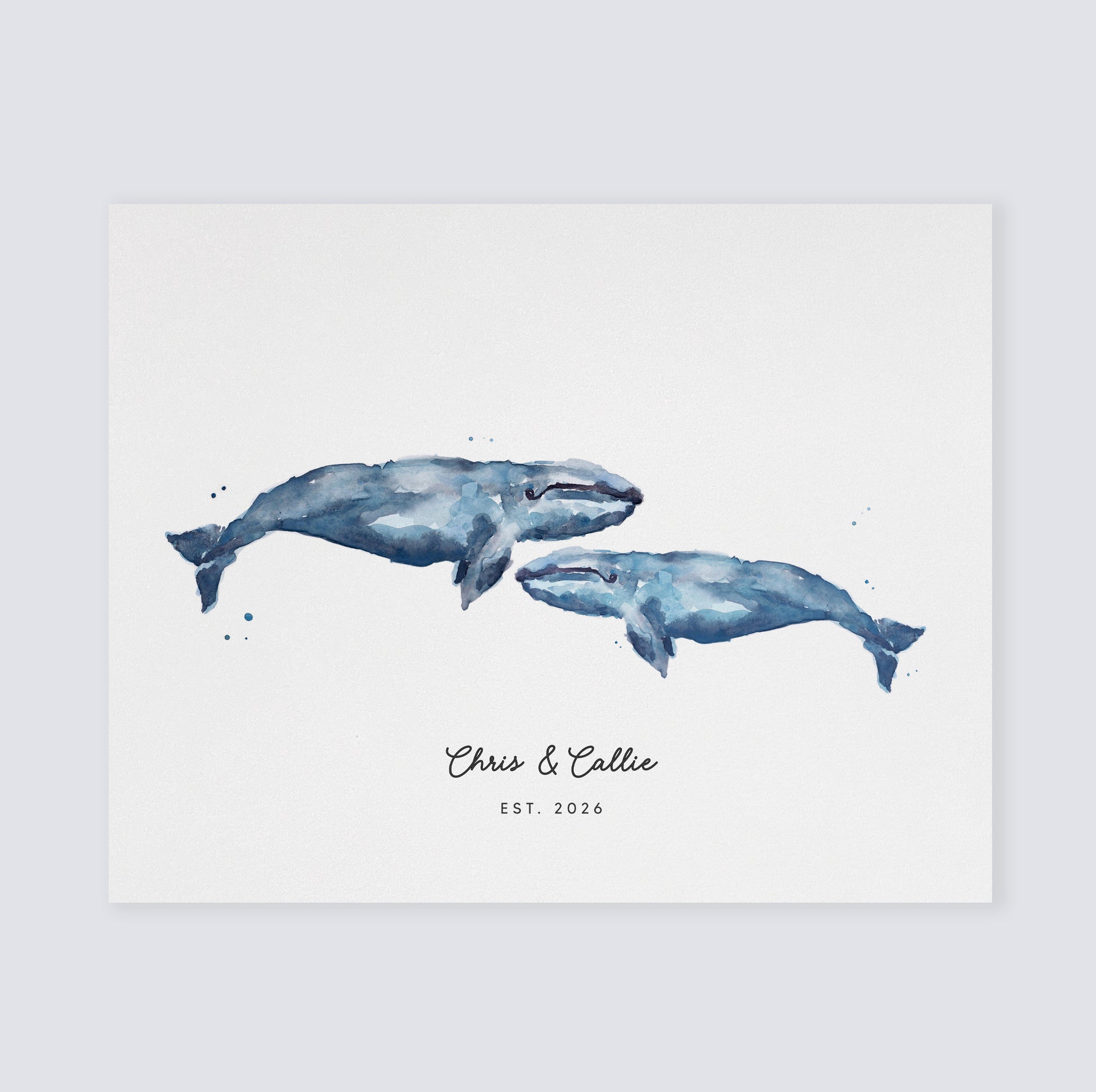 Watercolor illustration of two whales with personalized text on a light background