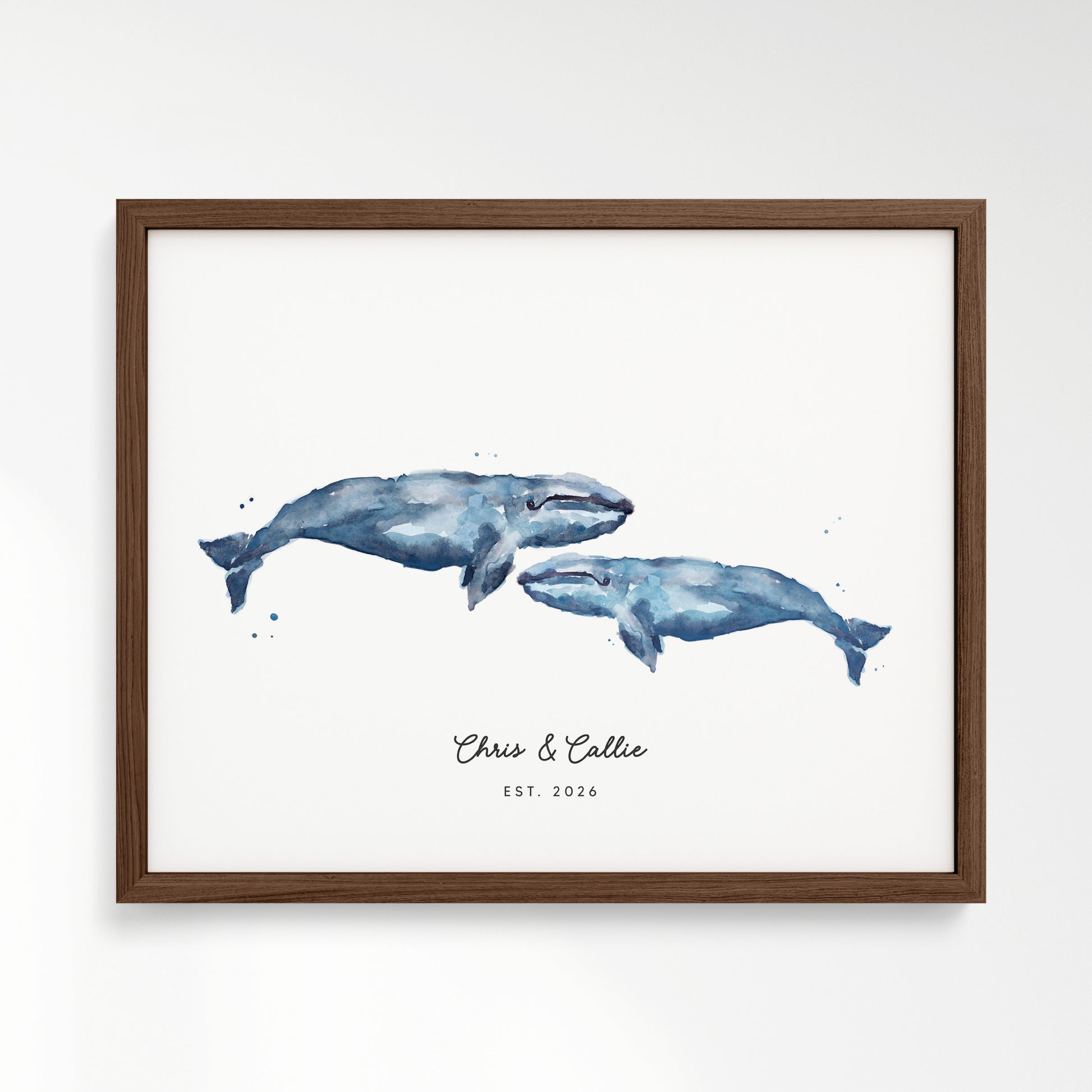 Framed artwork of two whales on a white background in walnut Frame