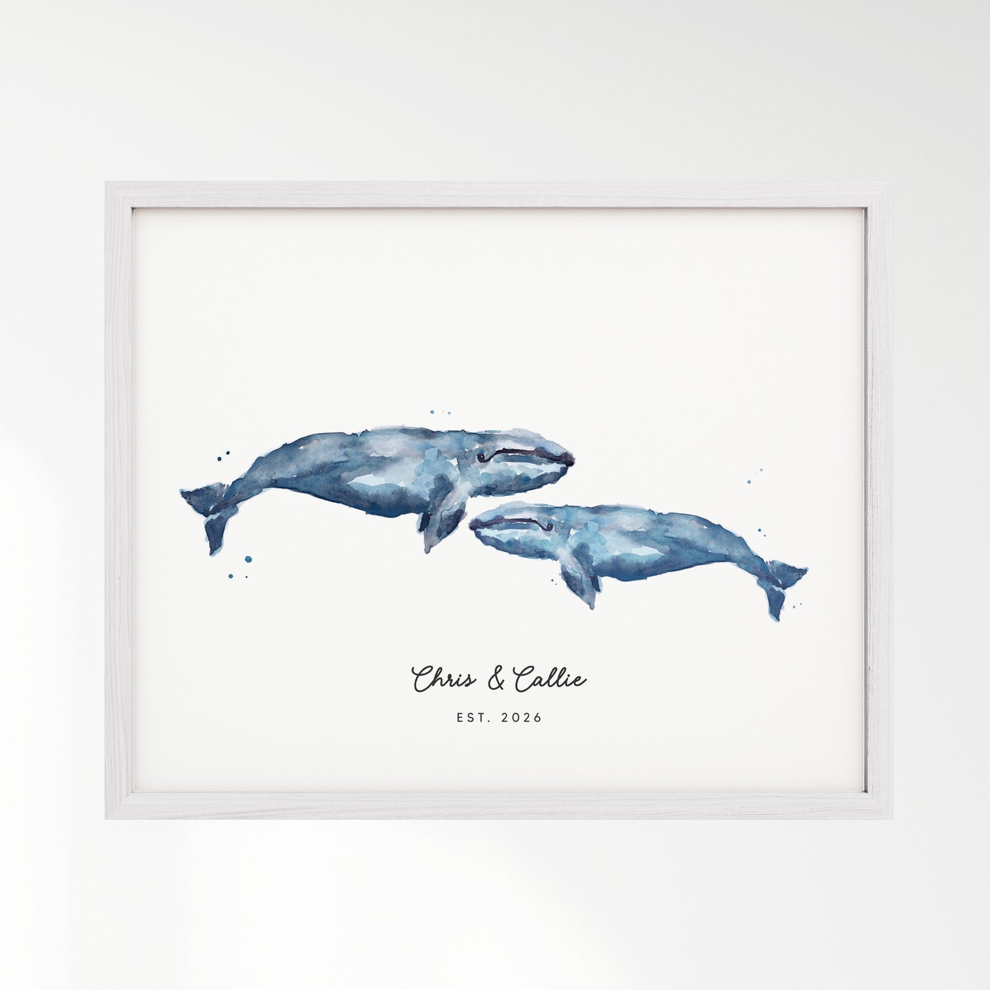 Framed artwork of two blue whales with 'Chris & Callie Est. 2026' text on a white background in White Frame