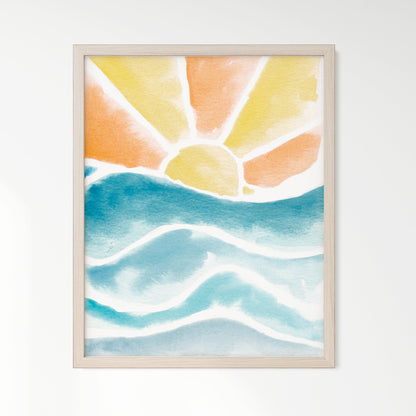 Sunset over waves watercolor art print framed in natural oak wood frame.
