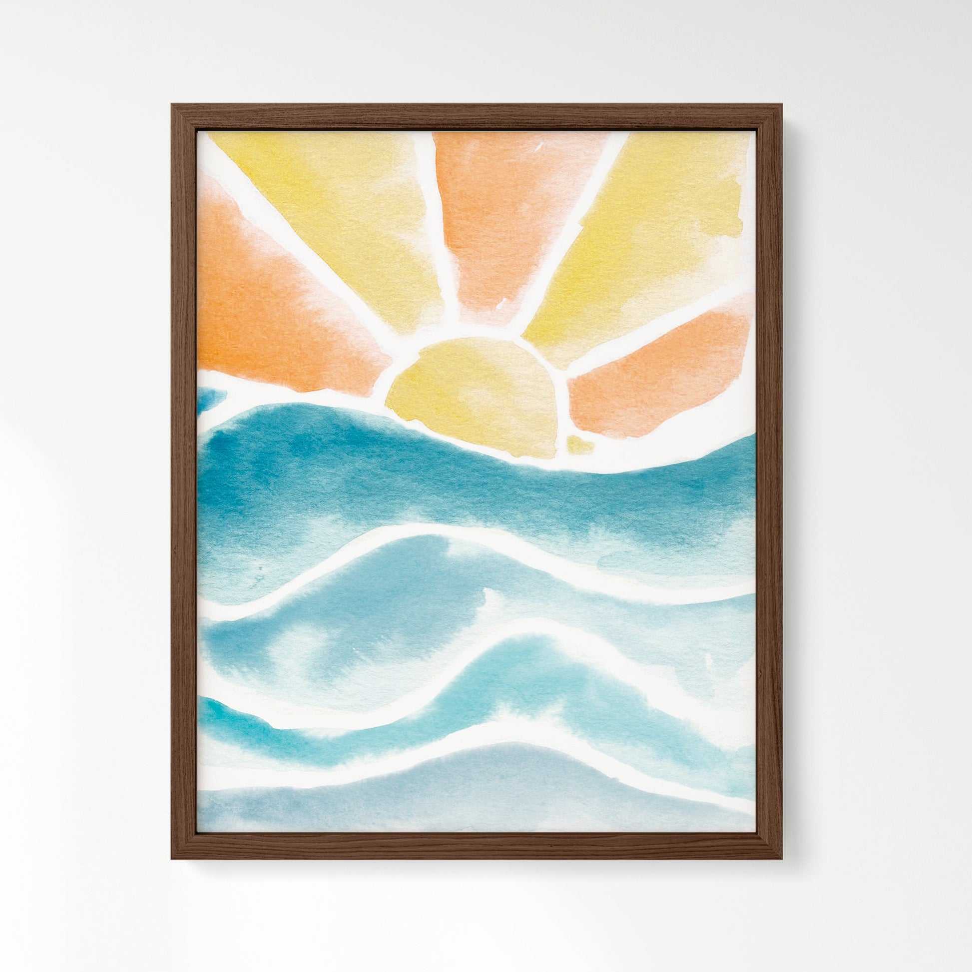 Sunset over waves watercolor art print framed in walnut wood frame.