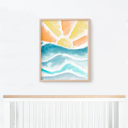 Waves and Sun watercolor print art hanging above white crib in beach nursery
