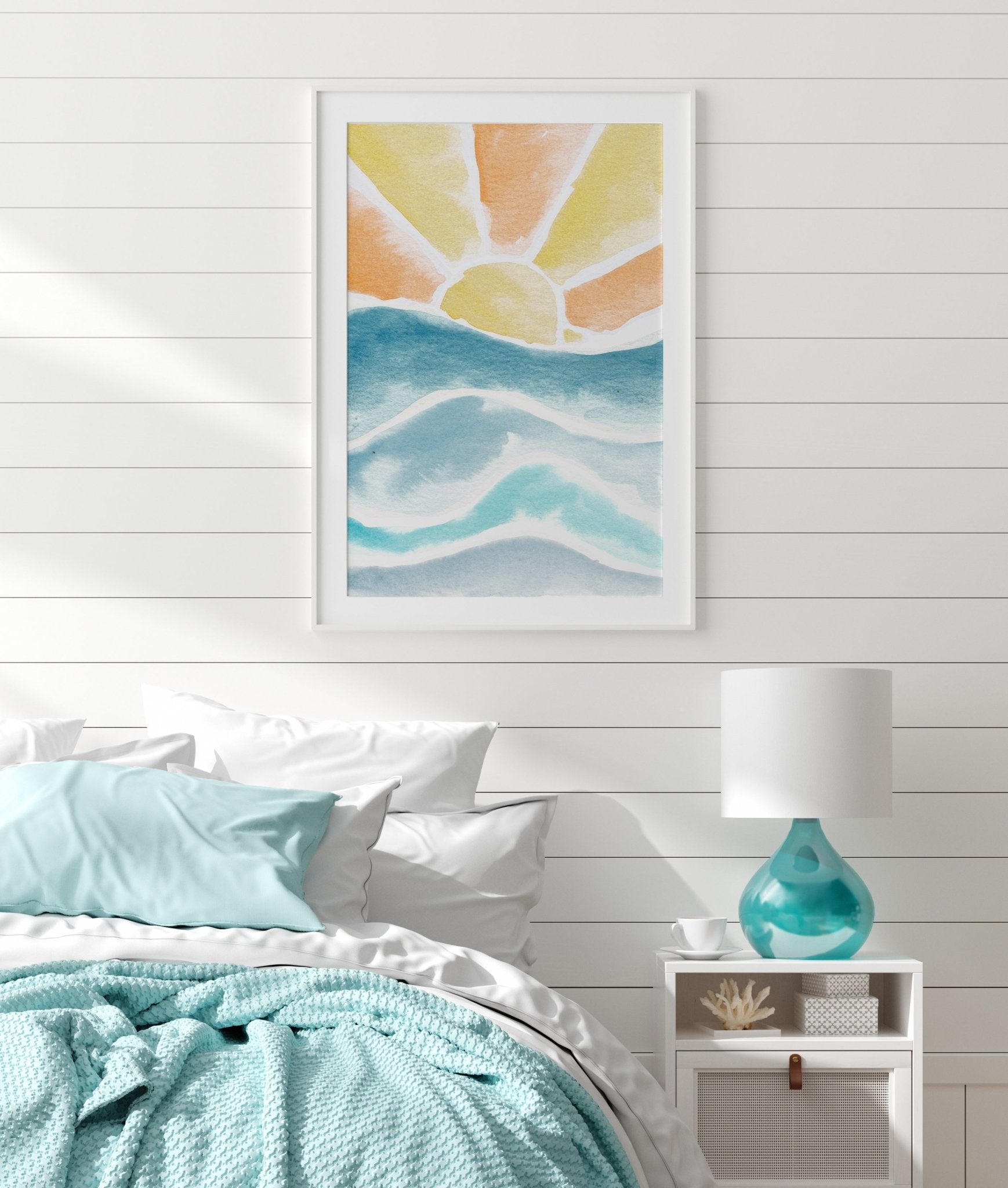 Ocean Sunset Watercolor Print Hanging Above Bed as beach house decor